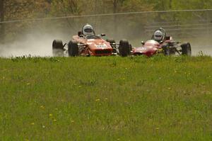 Rich Stadther's Dulon LD-9 Formula Ford gets into the oil dry as Jeff Ingebrigtson's Caldwell D9 Formula Ford follows.