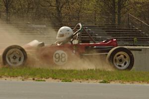 Jeff Ingebrigtson's Caldwell D9 Formula Ford spins in oil dry between turns 4 and 5.