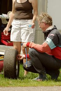 Steve Barkley checks tire pressures on his Euroswift SE-1 Formula Ford.