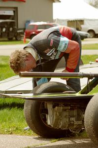 Steve Barkley checks tire pressures on his Euroswift SE-1 Formula Ford.