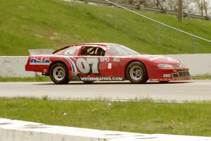 Ron Weyer's SPO Chevy Monte Carlo pulls off the track after the race.