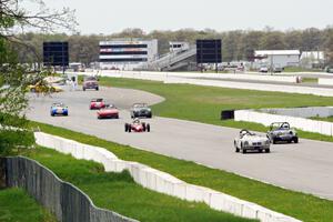 The field comes into the first turn after the green flag.