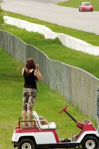 Shannon Ivey's Porsche 911SC is photographed by a spectator while headed into turn 1.