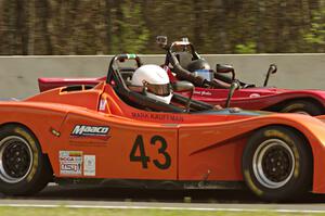 Mark Kauffman passes Jerret Gerber both in Spec Racer Fords