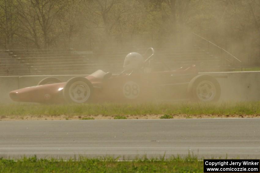 Jeff Ingebrigtson's Caldwell D9 Formula Ford spins in oil dry between turns 4 and 5.