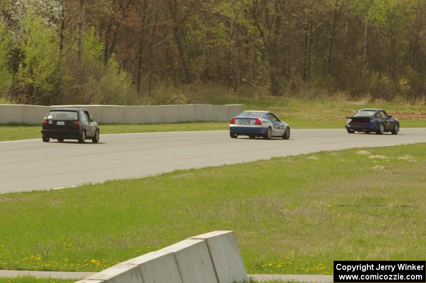 Craig Stephens' ITE-2 Porsche 911 with Rob Coffey's E Production Honda Prelude and David Daly's ITB VW GTI