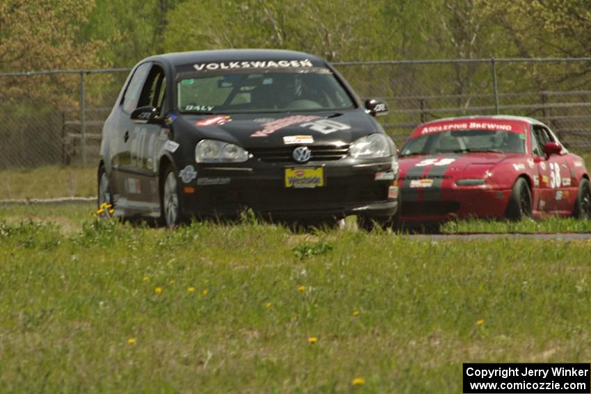 Tom Daly's T4 VW Rabbit and Lon Blaser's Spec Miata Mazda Miata