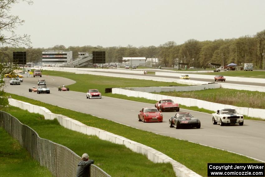 The field comes into turn one for the green flag.