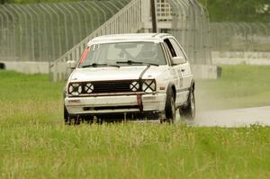 JAB Motorsport VW GTI slides off the track at turn 12.