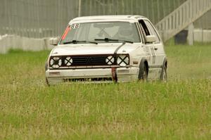 JAB Motorsport VW GTI slides off the track at turn 12.