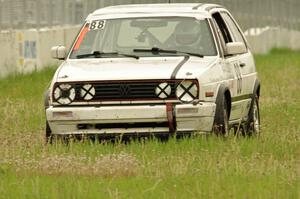 JAB Motorsport VW GTI slides off the track at turn 12.