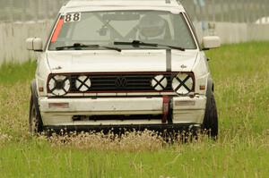 JAB Motorsport VW GTI slides off the track at turn 12.