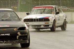 Tubby Butterman Racing 2 BMW 325 chases the Bear Patrol Lexus SC400