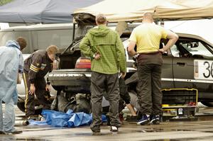 Ambitious But Rubbish Racing BMW 325 in the paddock for a lengthy stop.