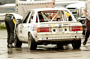 Tubby Butterman Racing 2 BMW 325 in the paddock for a lengthy stop.