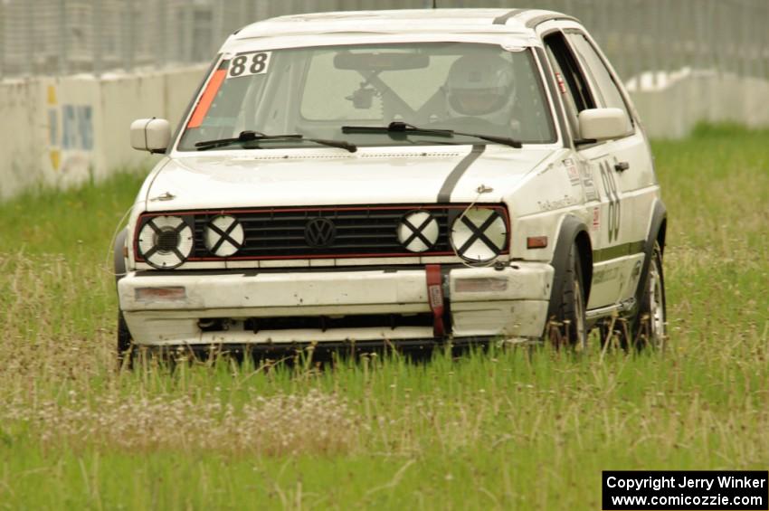 JAB Motorsport VW GTI slides off the track at turn 12.