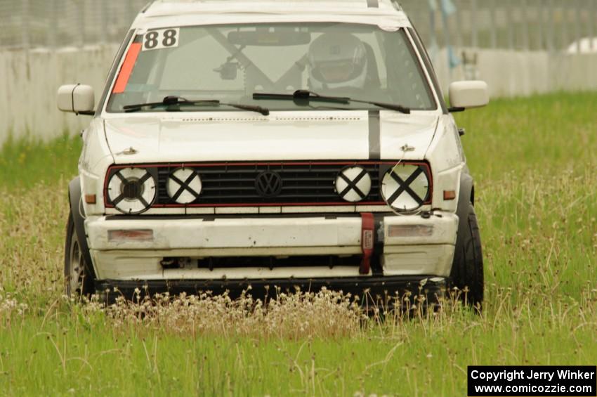 JAB Motorsport VW GTI slides off the track at turn 12.