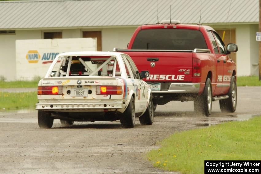 Tubby Butterman Racing 2 BMW 325 gets towed back to the paddock.