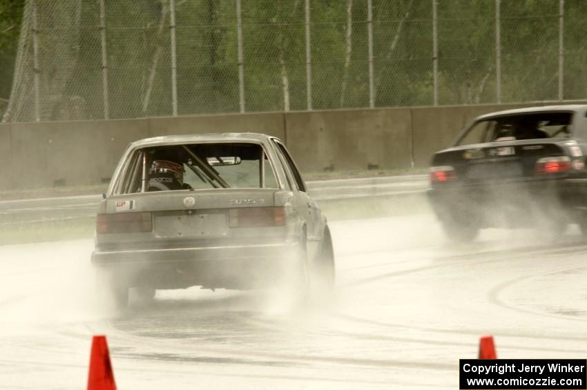 Shadetree Racing BMW 325 chases the North Loop Motorsport BMW 325i