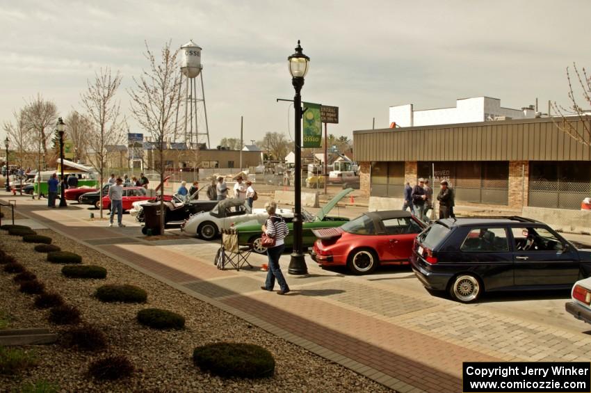 Various German and British cars on Main Street of Osseo