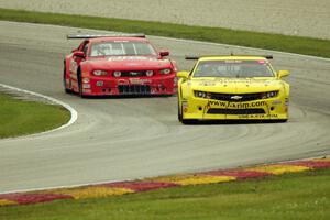 Tom Sheehan's Chevy Camaro and Ron Keith's Ford Mustang