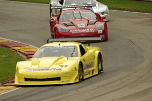 Doug Peterson's Chevy Corvette, Amy Ruman's Chevy Corvette and Cliff Ebben's Ford Mustang