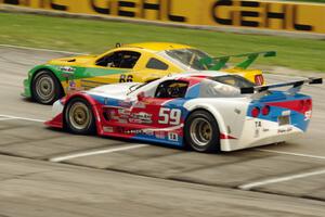 John Baucom's Ford Mustang and Simon Gregg's Chevy Corvette