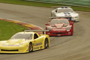 Doug Peterson's Chevy Corvette, Amy Ruman's Chevy Corvette and Cliff Ebben's Ford Mustang