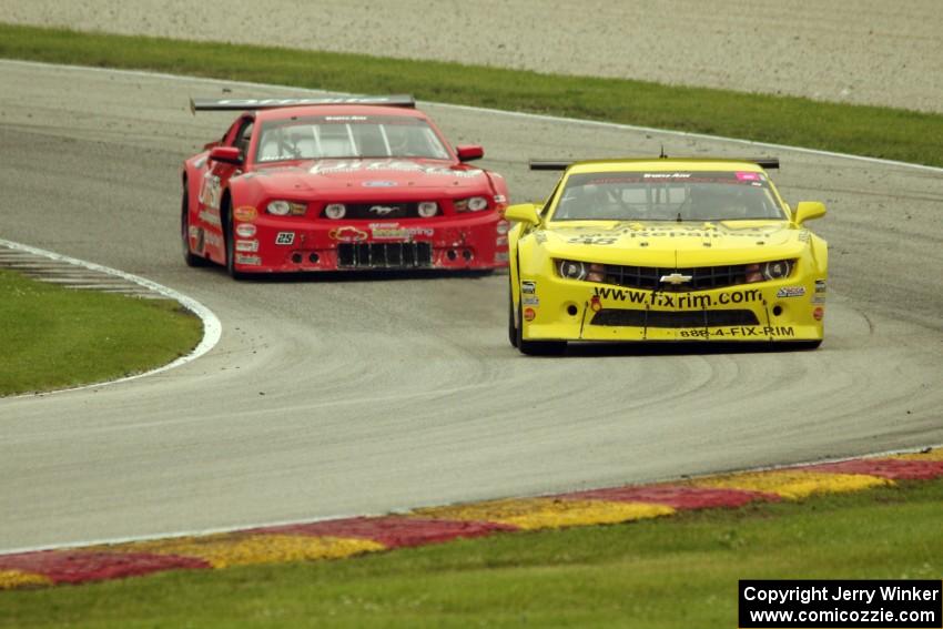 Tom Sheehan's Chevy Camaro and Ron Keith's Ford Mustang