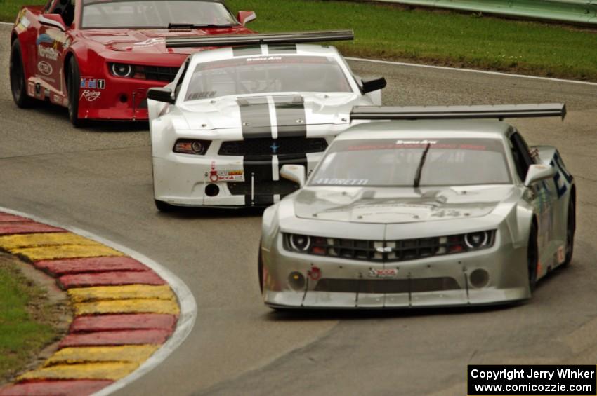 Adam Andretti's Chevy Camaro, Joe Ebben's Ford Mustang and Cameron Lawrence's Chevy Camaro