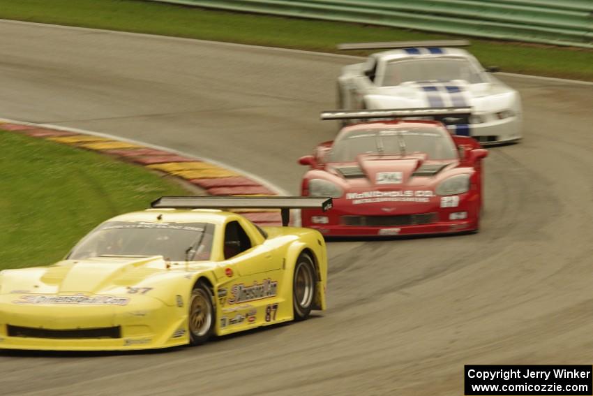 Doug Peterson's Chevy Corvette, Amy Ruman's Chevy Corvette and Cliff Ebben's Ford Mustang