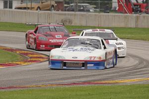 Tim Rubright's Ford Mustang, Denny Lamers' Ford Mustang and Amy Ruman's Chevy Corvette