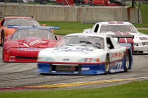 Tim Rubright's Ford Mustang, Jim McAleese's Chevy Corvette and Denny Lamers' Ford Mustang