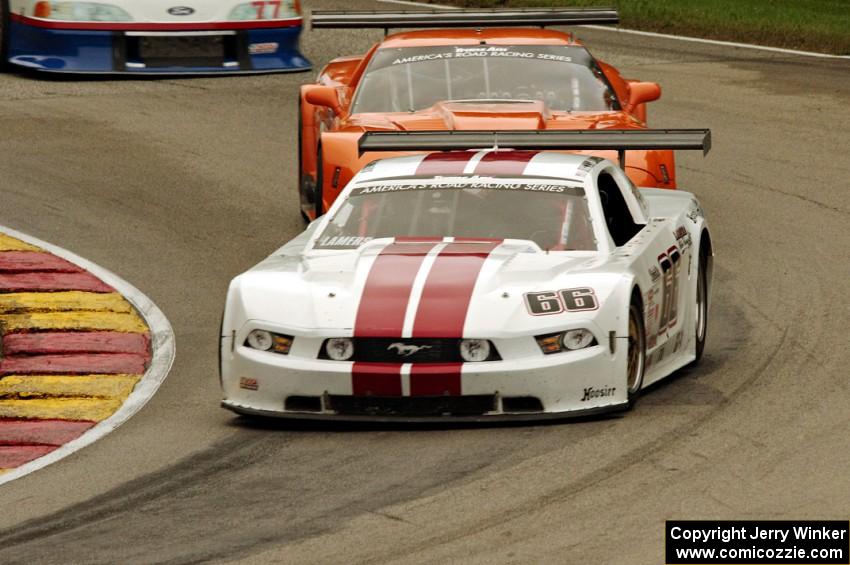 Denny Lamers' Ford Mustang and David Fershtand's Chevy Corvette