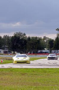 Doug Peterson's Chevy Corvette ahead of Jed Copham's Chevy Camaro