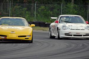 Norman Betts' Chevy Corvette battles Jerry Greene's Porsche GT3 Cup