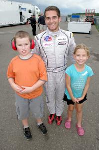 Cameron Lawrence and two fans after the race.