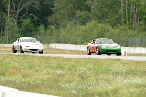 Erik Nelson's Spec Miata Mazda Miata and Ray Yergler's STL Mazda Miata