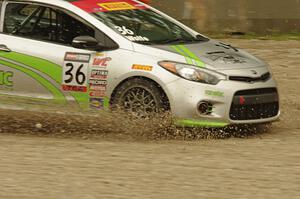 Jason Wolfe's Kia Forte Koup goes straight off at turn 12.