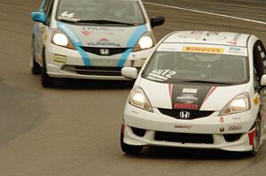 Johan Schwartz's Honda Fit and P.J. Groenke's Honda Fit