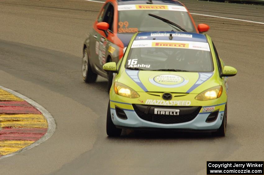 Michael Ashby's Mazda 2 and Austin Snader's Fiat 500