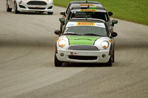 Jason Fichter's MINI Cooper, Nate Stacy's Ford Fiesta, Jim Cleveland's MINI Cooper, and Chris Capaldi's Ford Fiesta