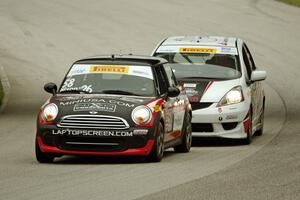 Glenn Nixon's MINI Cooper and Ryan Reed's Honda Fix