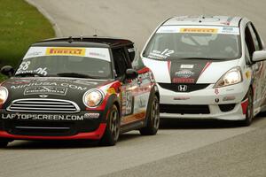 Glenn Nixon's MINI Cooper and Ryan Reed's Honda Fix