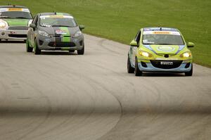 Michael Ashby's Mazda 2, Nate Stacy's Ford Fiesta and Jason Fichter's MINI Cooper