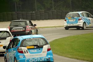 P.J. Groenke's Honda Fit leads Glenn Nixon's MINI Cooper, Ryan Reed's Honda Fix and Paul Holton's Honda Fix