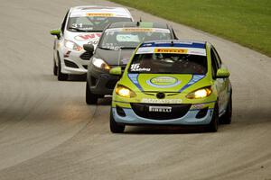 Michael Ashby's Mazda 2, Nate Stacy's Ford Fiesta and Chris Capaldi's Ford Fiesta