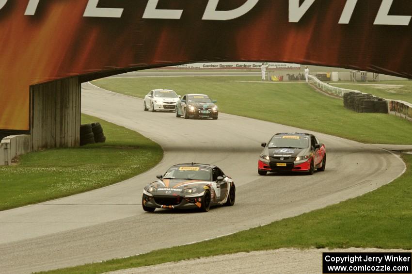 Adam Poland's Mazda MX-5, Michael DiMeo's Honda Civic Si, Bryan Heitkotter's Nissan Altima Coupe and Jon Miller's Honda Civic Si