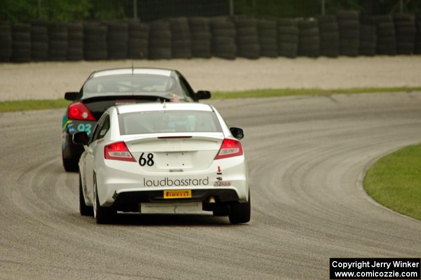 Jon Miller's Honda Civic Si chases Bryan Heitkotter's Nissan Altima Coupe