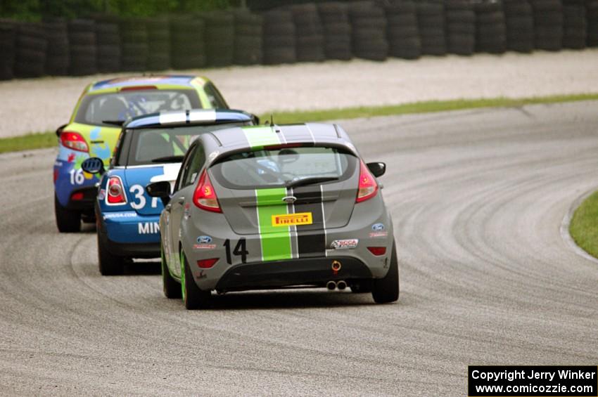 Michael Ashby's Mazda 2, Tyler Palmer's MINI Cooper and Nate Stacy's Ford Fiesta